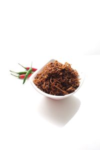 Close-up of food on table against white background