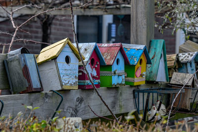 Multi colored umbrellas on wooden building