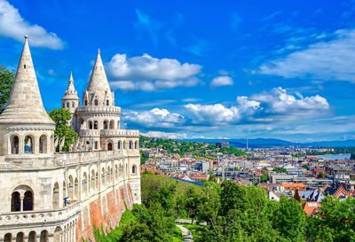 High angle view of townscape against blue sky