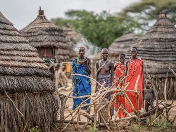 Rear view of people outside building