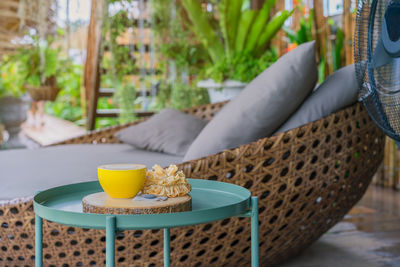 Close-up of drink in basket on table