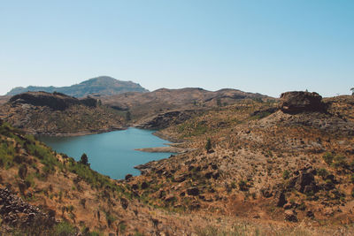 Scenic view of mountains against clear sky