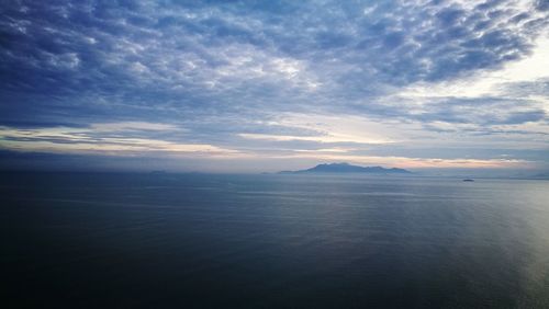 Scenic view of sea against sky at sunset