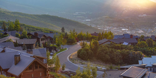 High angle view of houses and buildings against sky