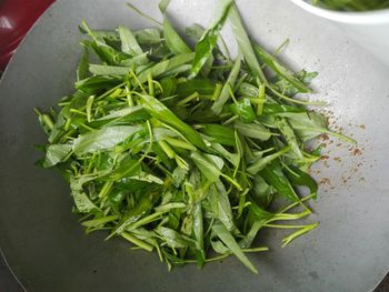 High angle view of chopped vegetables on leaves