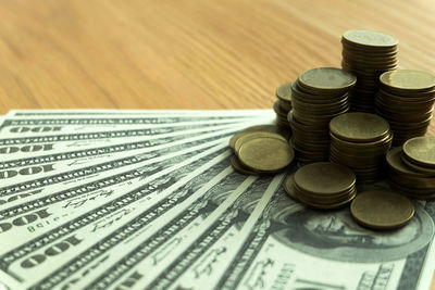 High angle view of coins on table