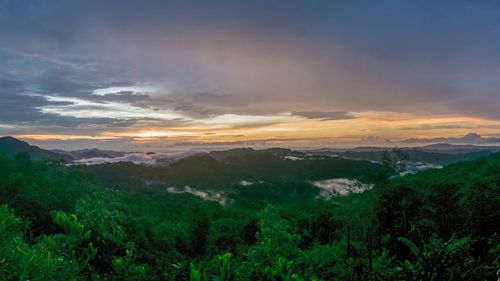 Scenic view of landscape against sky during sunset