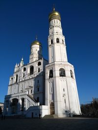 Low angle view of cathedral against blue sky