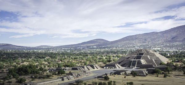 Landscape with mountain range in background