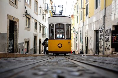 Train on railroad track against sky