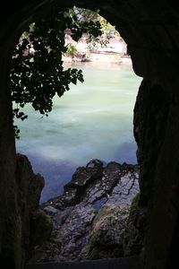 View of rock formations in water