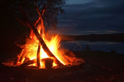 Bonfire against sky at night