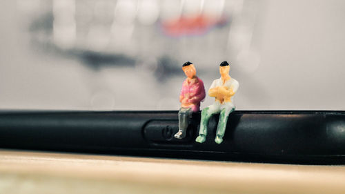 Close-up of stuffed toy on car window