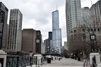 Modern buildings in city against sky