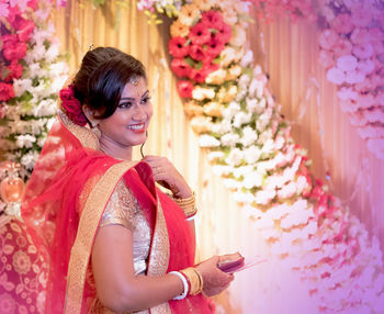 Bride smiling during wedding ceremony