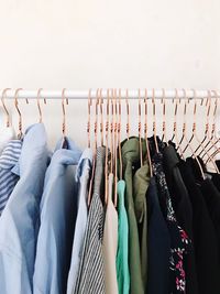 Clothes hanging in rack