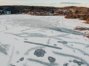 Scenic view of snow covered field