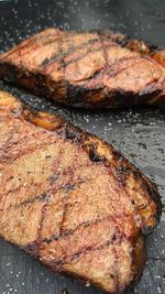 Close-up of meat on barbecue grill