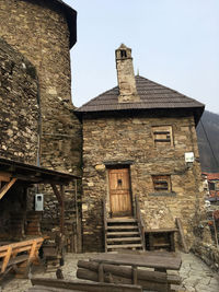 Low angle view of old building against clear sky