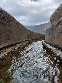 Surface level of river against sky