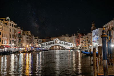 Beautiful view of grand canal and rialto bridge in venice, italy at night