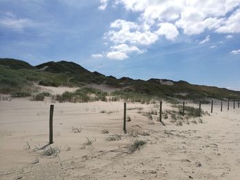 Scenic view of beach against sky