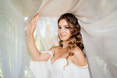 Portrait of smiling young woman