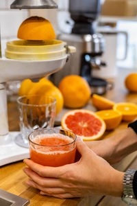 Cropped hand of person preparing food