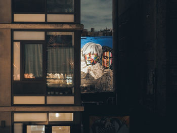 Portrait of man seen through glass window