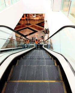 People on escalator