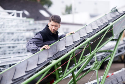 Skilled worker, working in conveyor belt shop