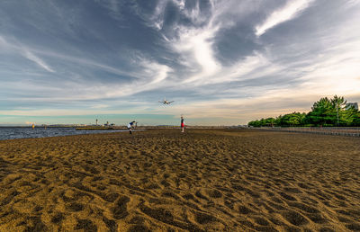 Scenic view of beach against sky