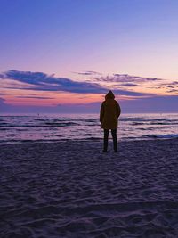 Man standing on the seashore