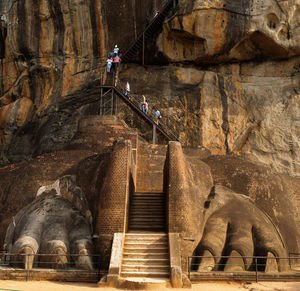 Staircase by rock formation