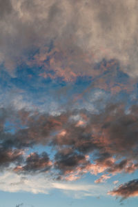 Low angle view of dramatic sky during sunset