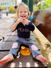 Portrait of cute girl playing outdoors