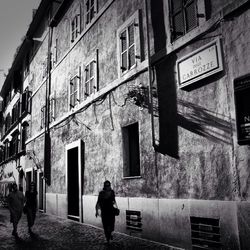 Woman standing in city