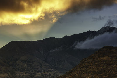 Scenic view of mountains against sky during sunset