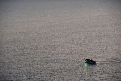 High angle view of sailboat sailing on sea