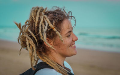 Portrait of smiling person on beach