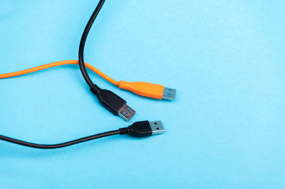 High angle view of cable on blue background
