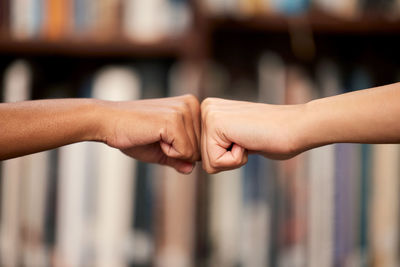 Cropped hand of woman holding hands