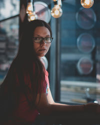 Portrait of young woman looking away