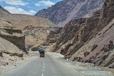 Road amidst rocky mountains