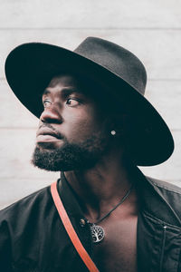 Portrait of young man looking away