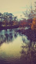 Scenic view of lake against sky during autumn