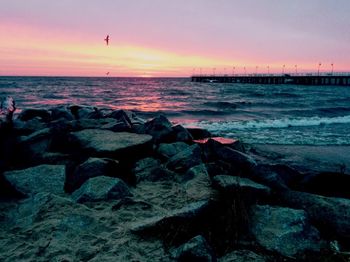 Scenic view of sea against sky during sunset