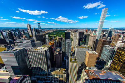 High angle view of buildings in city against sky