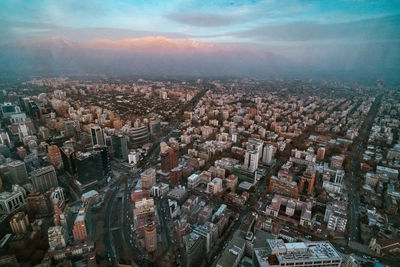 Aerial view of cityscape against sky