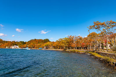 Scenic view of sea against sky during autumn